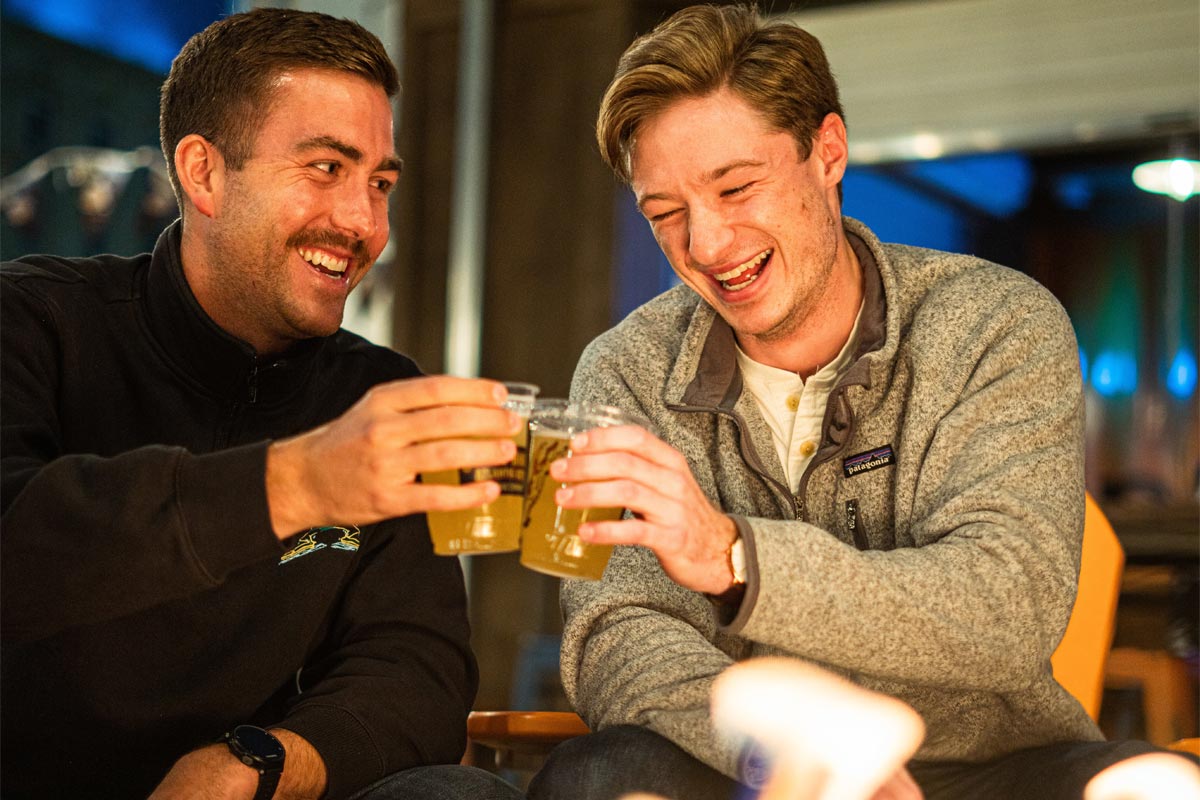 photo of two men drinking alcohol