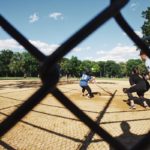 photo of people in the field playing baseball addiction recovery activities