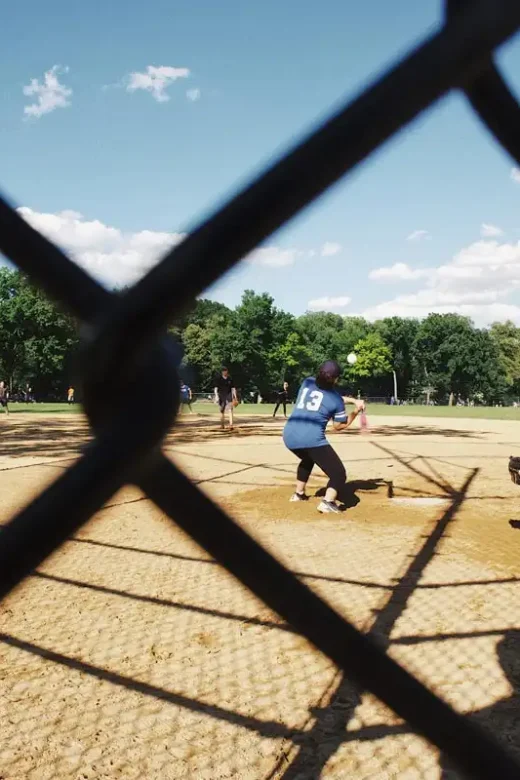 photo of people in the field playing baseball addiction recovery activities