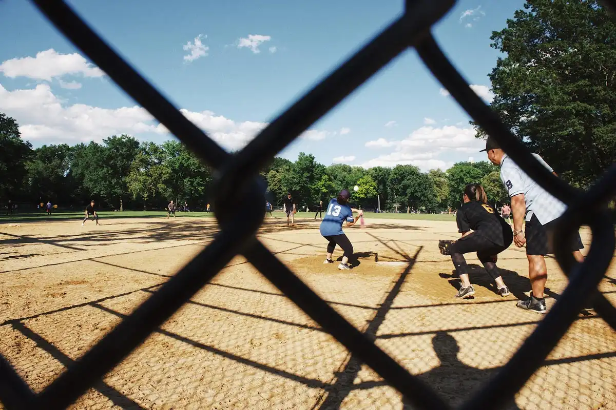 photo of people in the field playing baseball addiction recovery activities