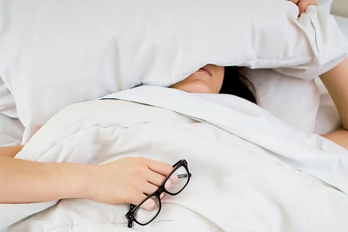 photo of a woman having trouble with sleeping
