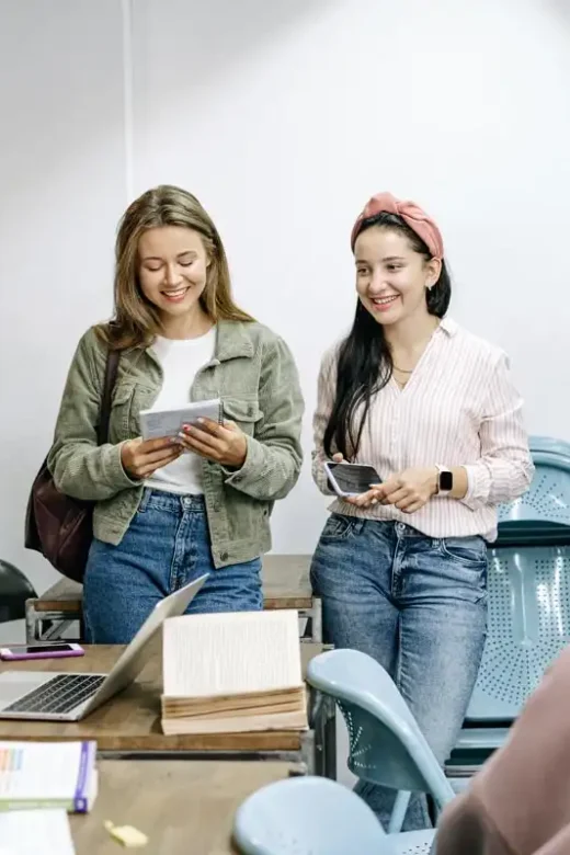 photo of male and female college students inside the campus