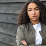 photo of a thoughtful beautiful young mixed race African American, qiuet time concept