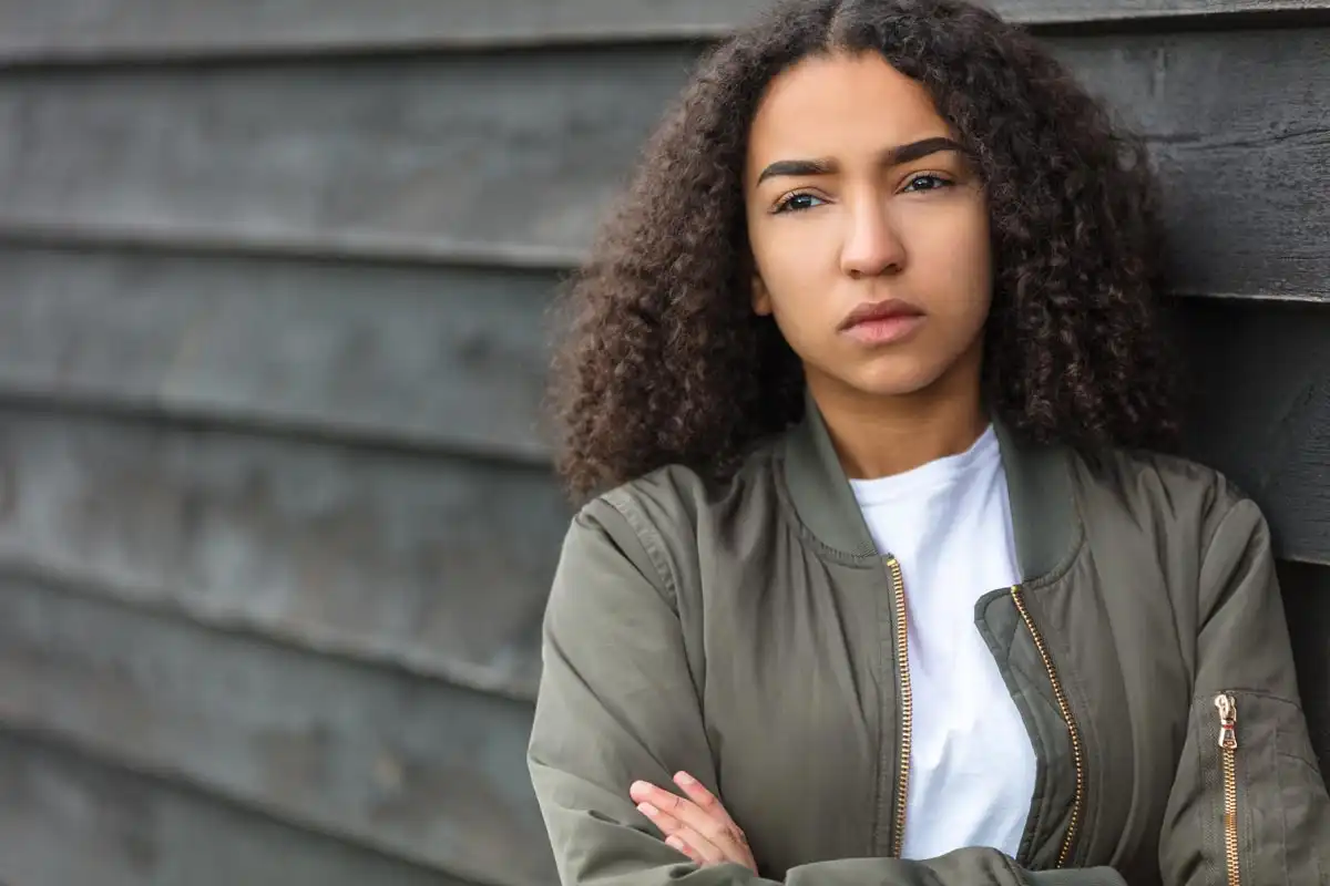 photo of a thoughtful beautiful young mixed race African American, qiuet time concept