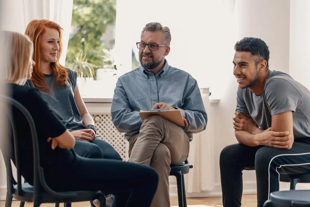 a photo of a family during a therapy