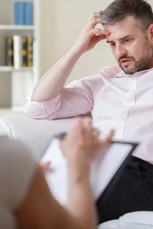 photo of man talking to a psychologist during his Treatment for Opiate Addiction