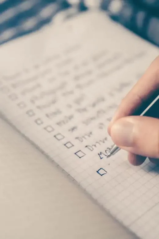 photo of a man creating a list of his goals in life