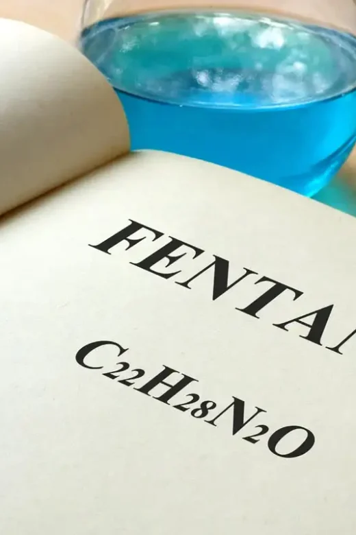 Book with fentanyl and test tubes