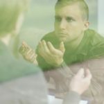 photo of psychologist and a soldier with PTSD