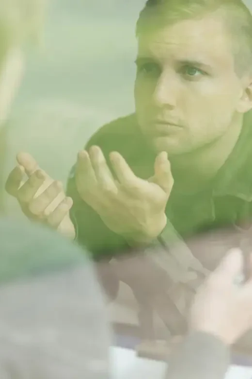 photo of psychologist and a soldier with PTSD