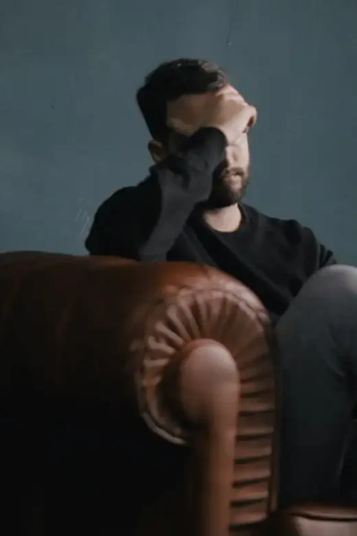 photo of a man experiencing feelings of irritability