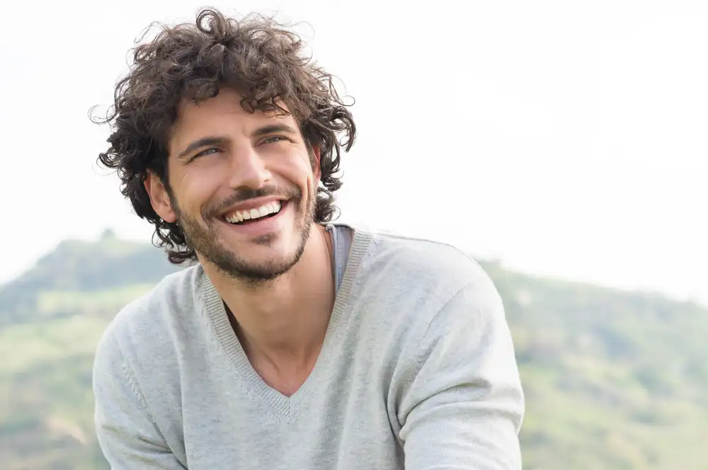 handsome young man smiling