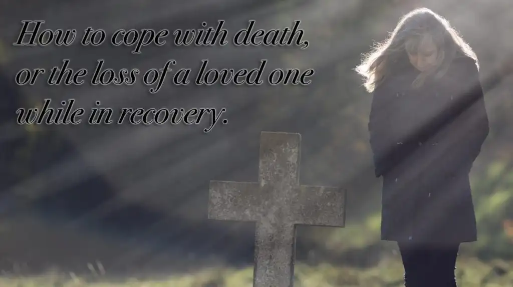 a woman grieving in the cemetery coping with death of a loved-one