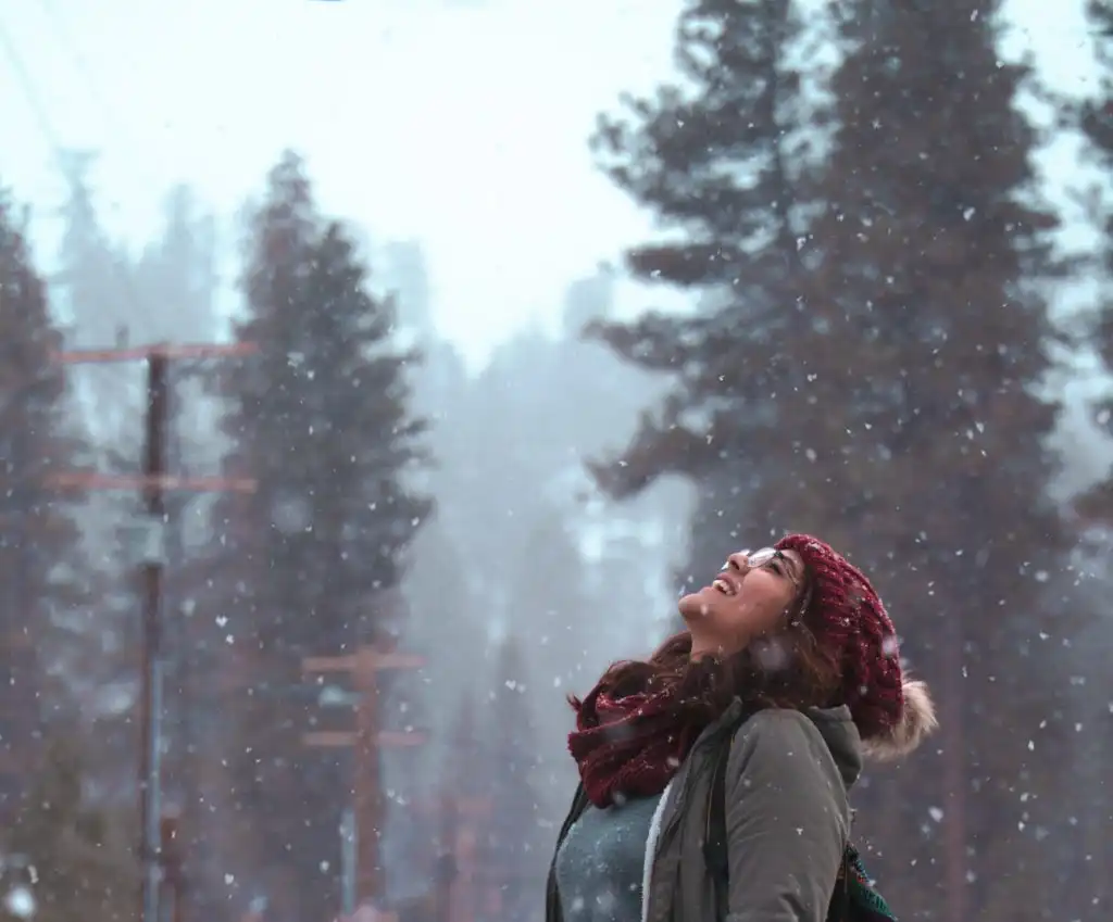 Woman outside in winter combating her seasonal depression