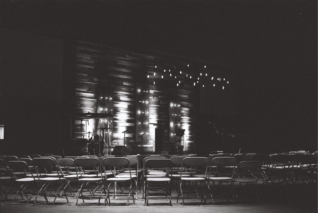 empty chairs and stage of a church