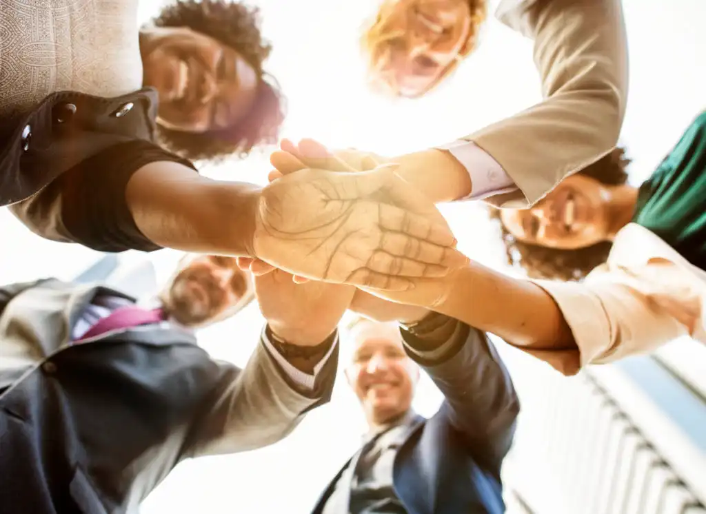 a diverse team of employees working together to combat alcohol and drug abuse in their workplace