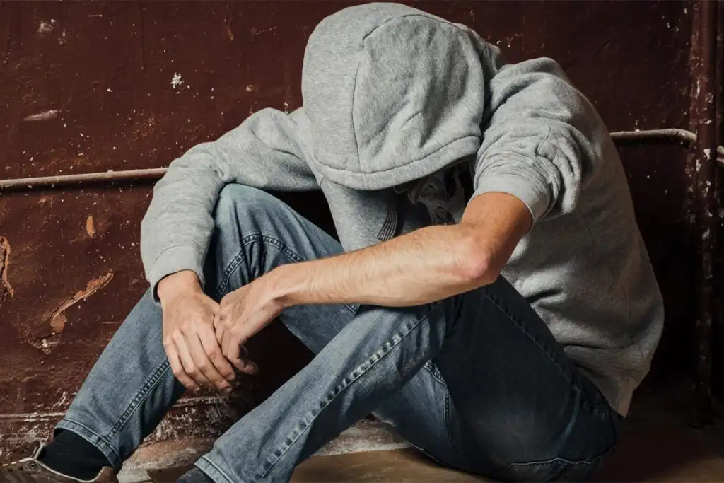 a man showing some Signs and Symptoms of Meth Addiction