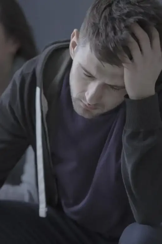 a recovering addict during group therapy in addiction treatment center in Riverside CA