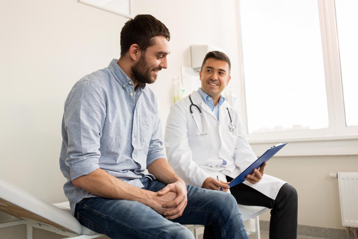 photo of a man and doctor during Medication Assisted Treatment