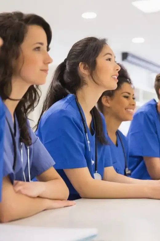 Medical students listening sitting at desk at the university
