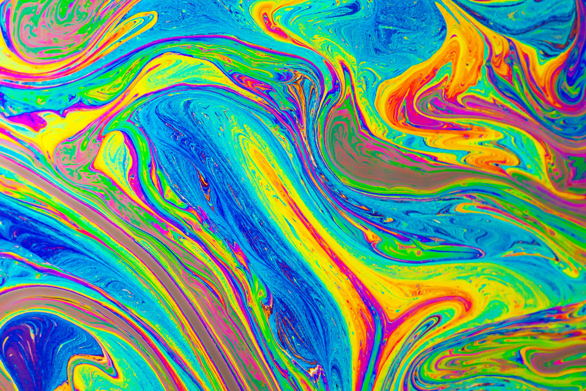 Natural dynamic mixture of oil colored pigments fluid flow background, LSD concept,Psychedelics