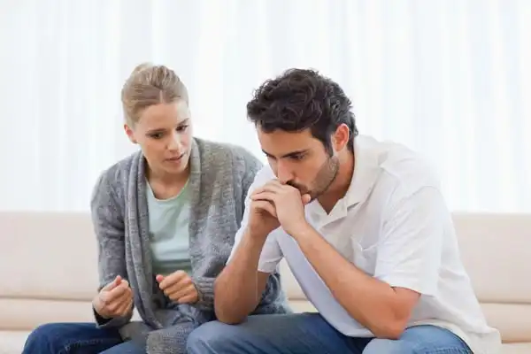 a wife practising tough love, talking to her addict husband setting things straight