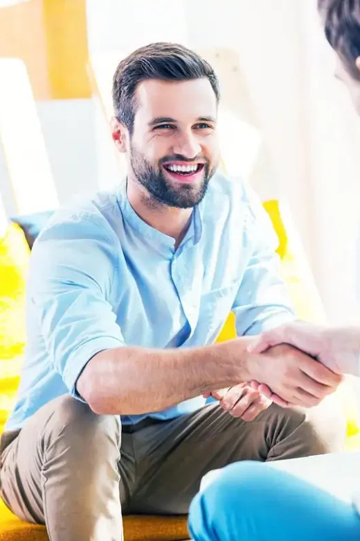 an employee being welcome at work after drug rehab