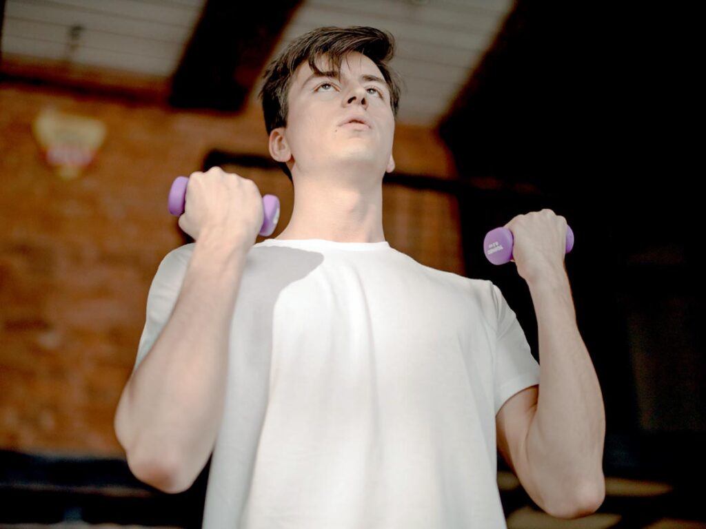 young handsome man doing some exercises