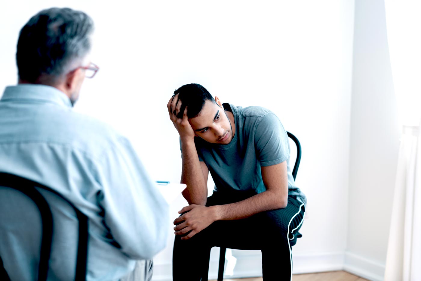 a young man during his stress management therapy