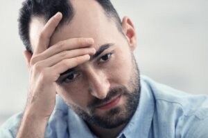 man thinking about alcohol detox