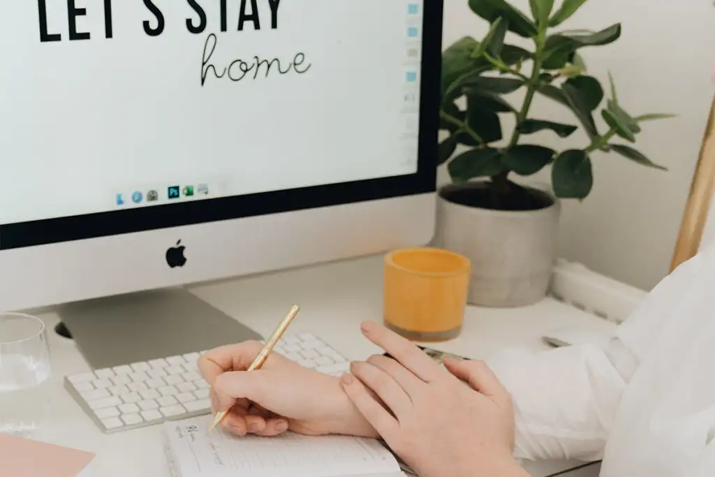 female college student writing journal