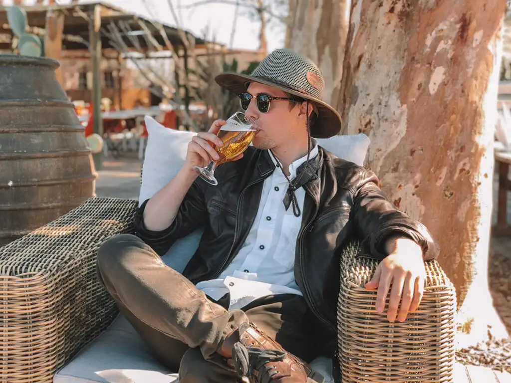man drinking alcohol