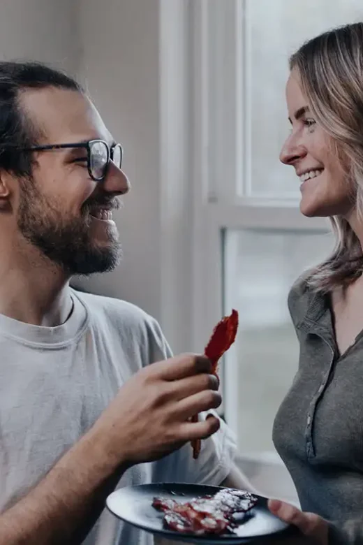 sweet couple eating together