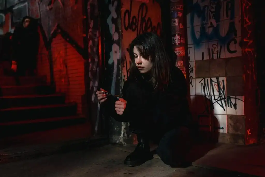 young woman struggling with cocaine overdose