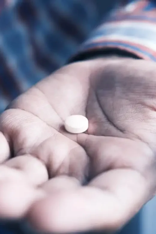 man holding Fake Opioid