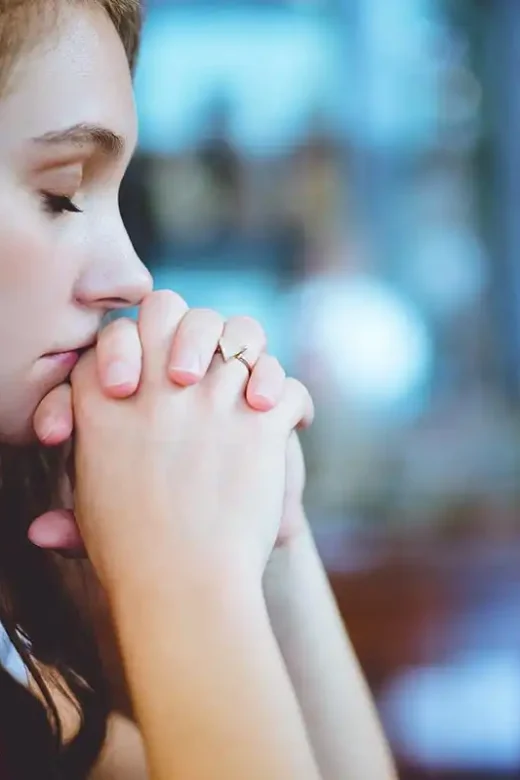 woman praying to God The Importance of Prayer in Addiction Recovery