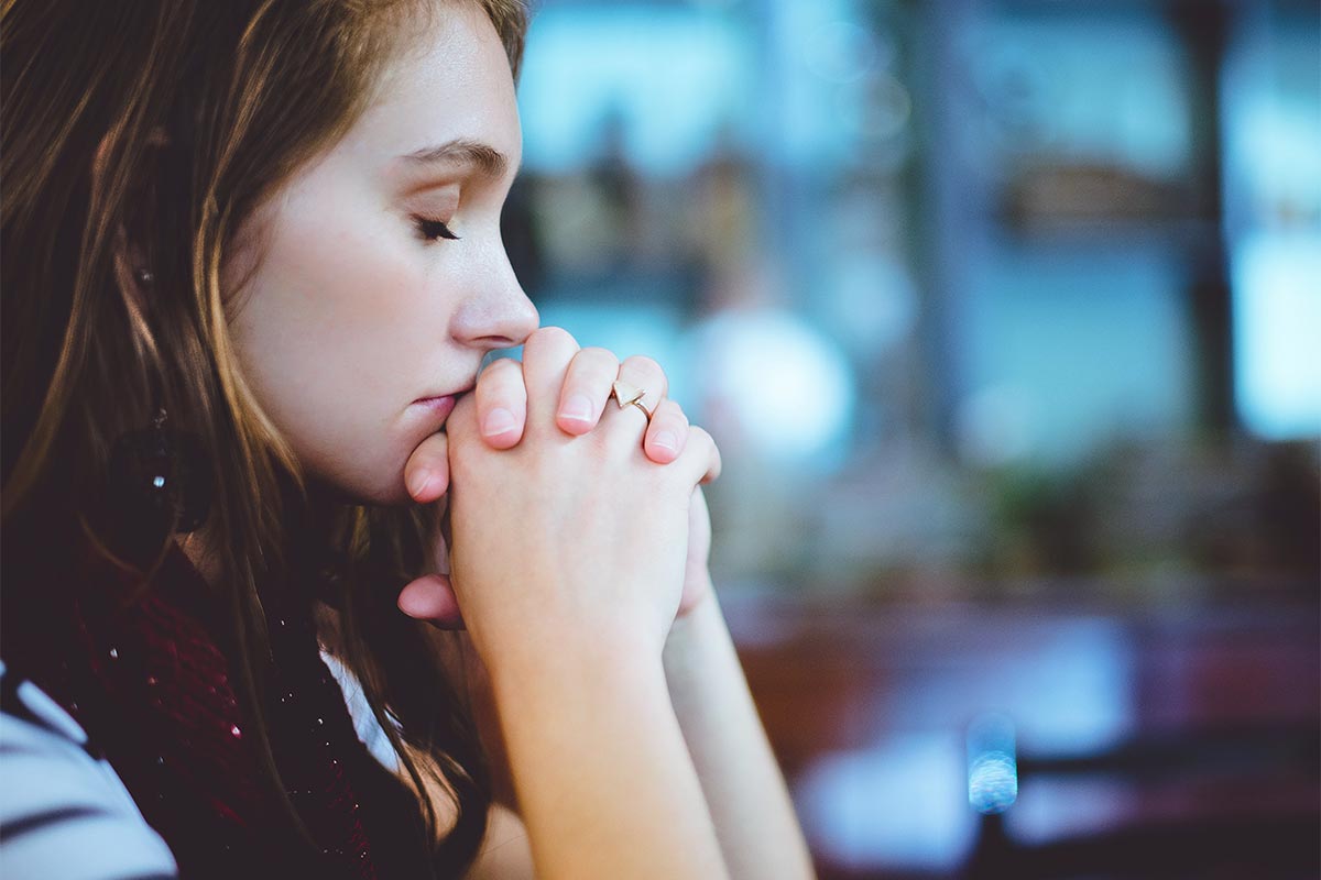 woman praying to God