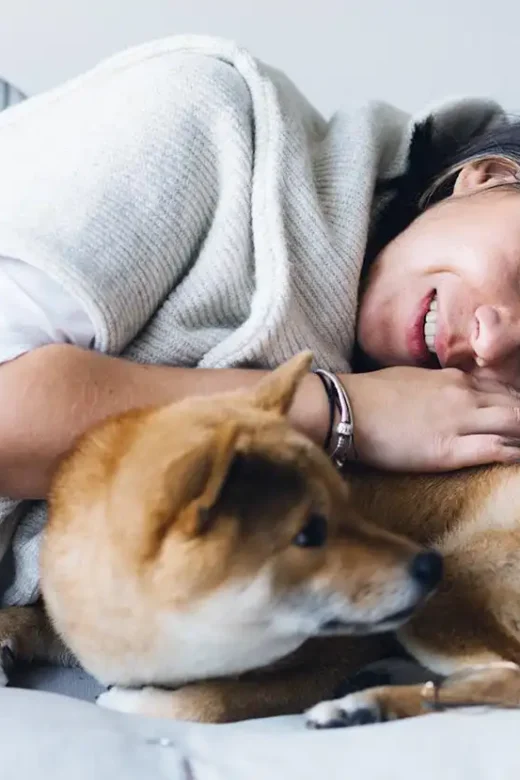 Woman Taking Care of her Pet after recovery