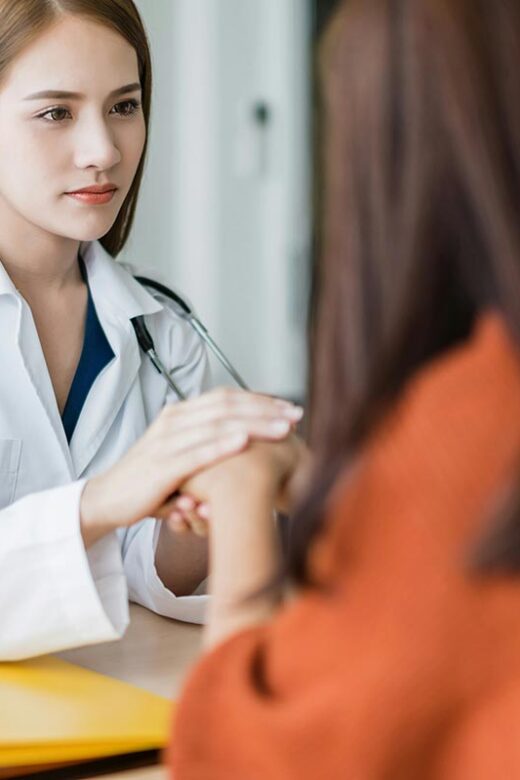 female client talking to her doctor