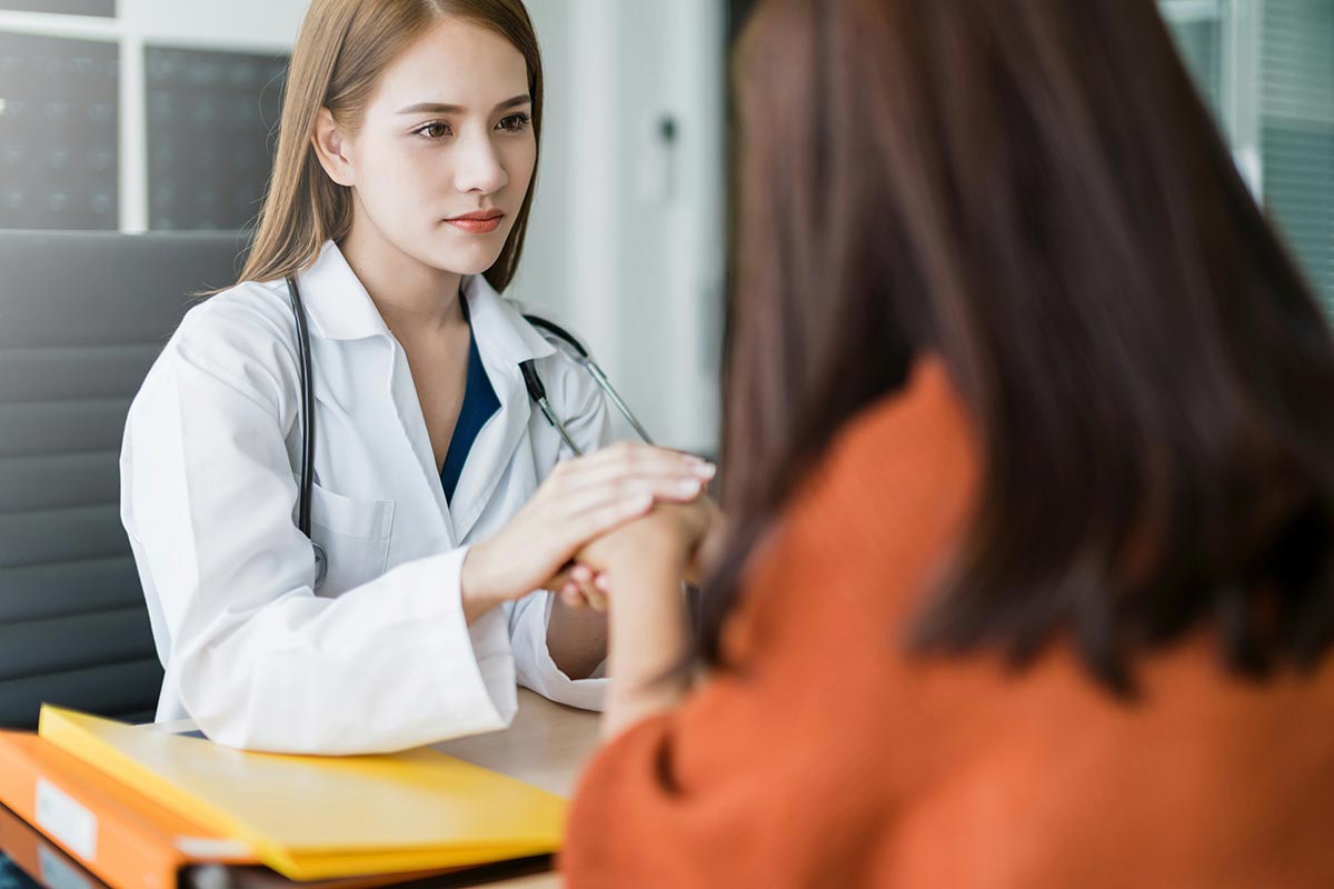 female client talking to her doctor