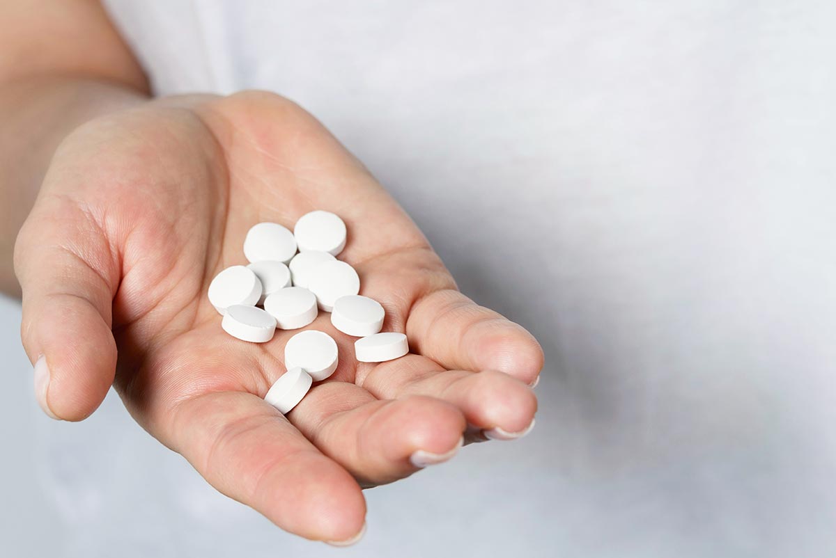 a handful of white medicines captagon concept middle eastern drug