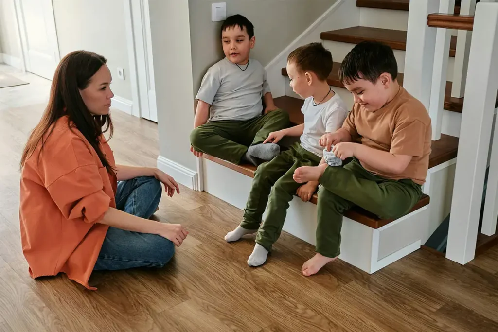 a mom talking to his 3 kids about her plan to go to the rehab