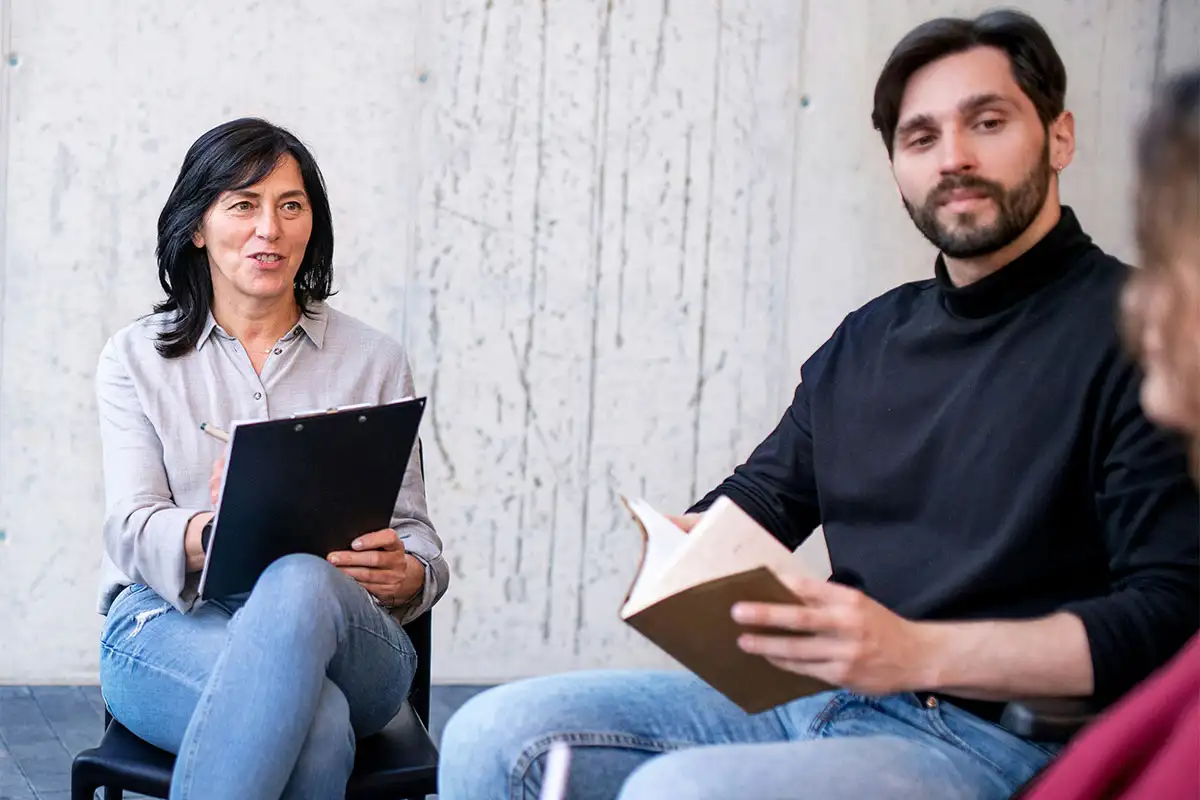 men and women during group therapy session in riverside california