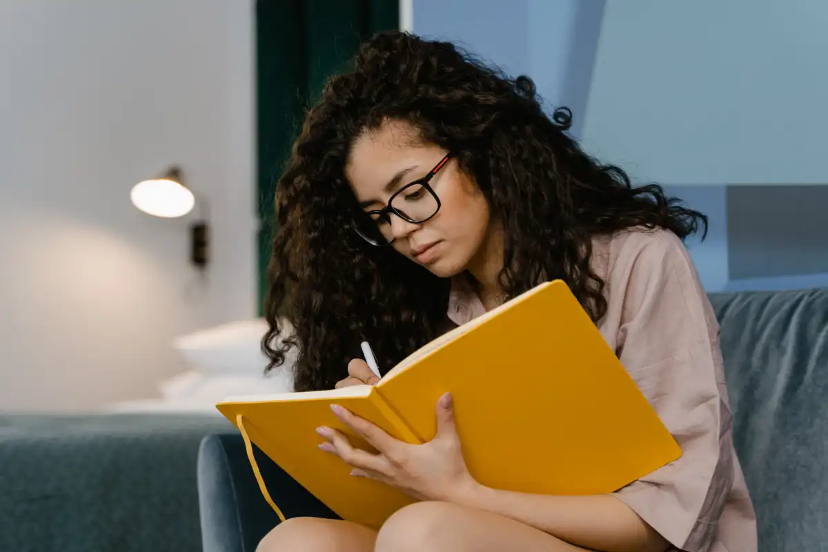 female client writing journal