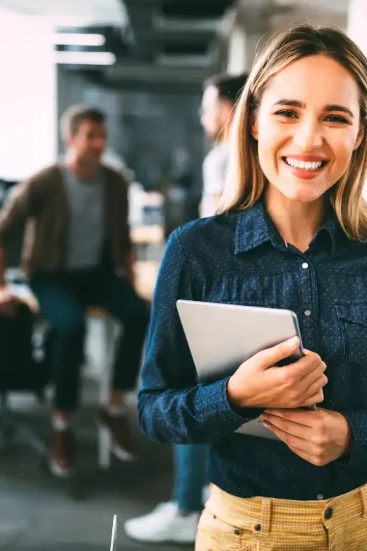 female employee smiling for the camera