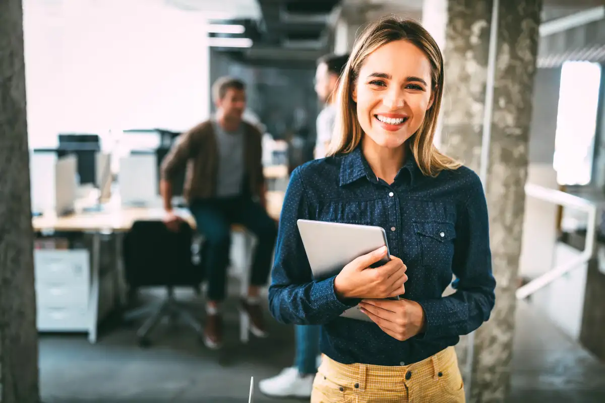 female employee smiling for the camera