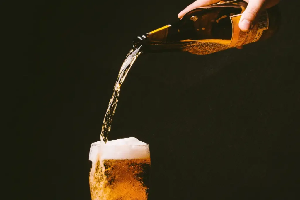 pouring alcohol in a glass