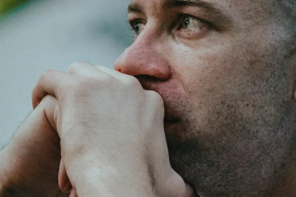 Thoughtful Man in Casual Outdoor Setting