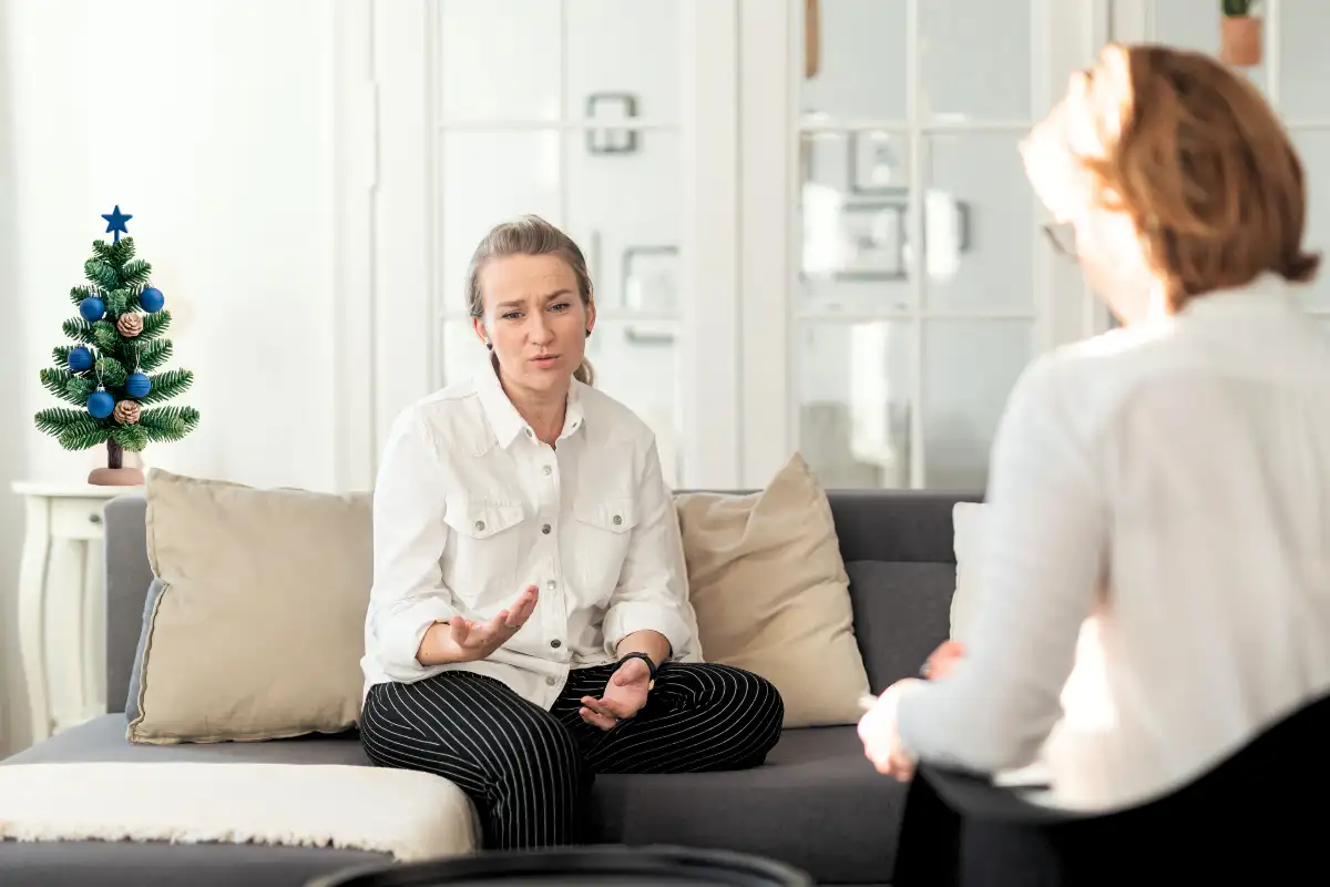 a woman listening in individual therapy session