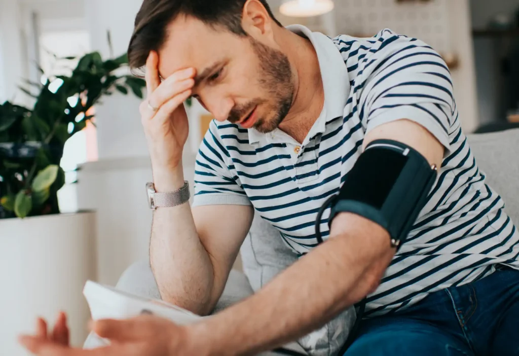 man suffering from High blood pressure